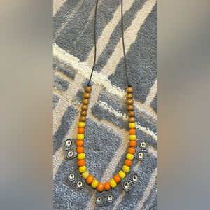 Orange and Yellow with Silver ornaments and black string, one size, ArtikCrafts.